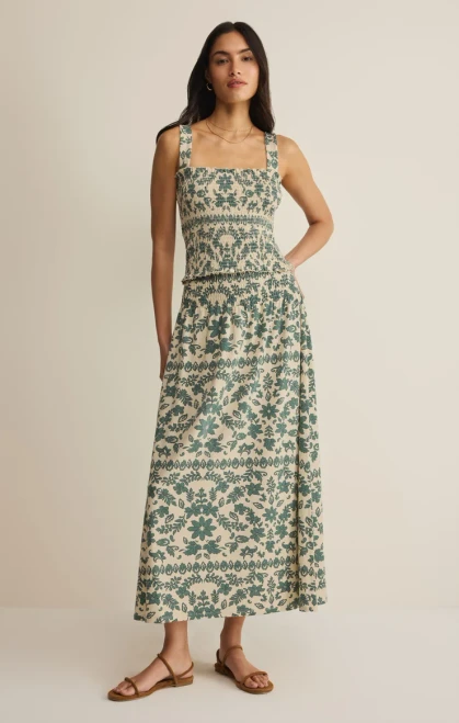 A pretty paisley floral print brings a feminine feel to this flowing maxi skirt, crafted in a soft jersey with a silky handfeel. Featuring a smocked waistband for all-day comfort, you can pair it with the matching top for the coordinating skirt set.