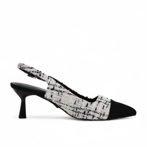 Don't be deceived, these heels are comfy as can be. Step into elegance with the Women's Mariella Kitten Heel by CHINESE LAUNDRY, a sophisticated choice for evening events. Crafted in chic black and white tweed, these heels feature an open toe design paired with a comfortable 2.5-inch kitten heel, making them perfect for spring and a stylish addition to workwear trends. Designed for adult women, these mid-height heels effortlessly blend style and comfort for any occasion.