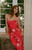 Luxe satin with smocking and a flirty cutout creates an eye-catching look that won't go unnoticed.
