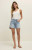 Designed with comfort in mind, these cotton denim shorts have just the right amount of stretch for all-day wear. A closet staple that will you can throw on with anything from a cozy sweater to a flowy linen top.

Regular fit
Vintage Comfort Stretch: 99% Cotton, 1% Lycra
High rise
Zip fly with button closure
Five-Pocket
Machine Wash Cold, Gentle Cycle, Hang to Dry