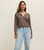 100% Cotton, crew neck, long sleeve, button front, and lightweight.