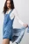 Your easiest instant outfit, this denim shortall from our We The Free collection features a slouchy, shapeless silhouette and classic pinafore design for a timeless touch.

Square neckline
Front zip closure with offset button tab
Four-pocket design
