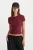 The second-skin baby tee. A cropped, form-hugging fit with a slim, flattering shape and crew neckline. Made from premium smooth cotton with unparalled stretch that molds to your curves and comfortably holds you in.