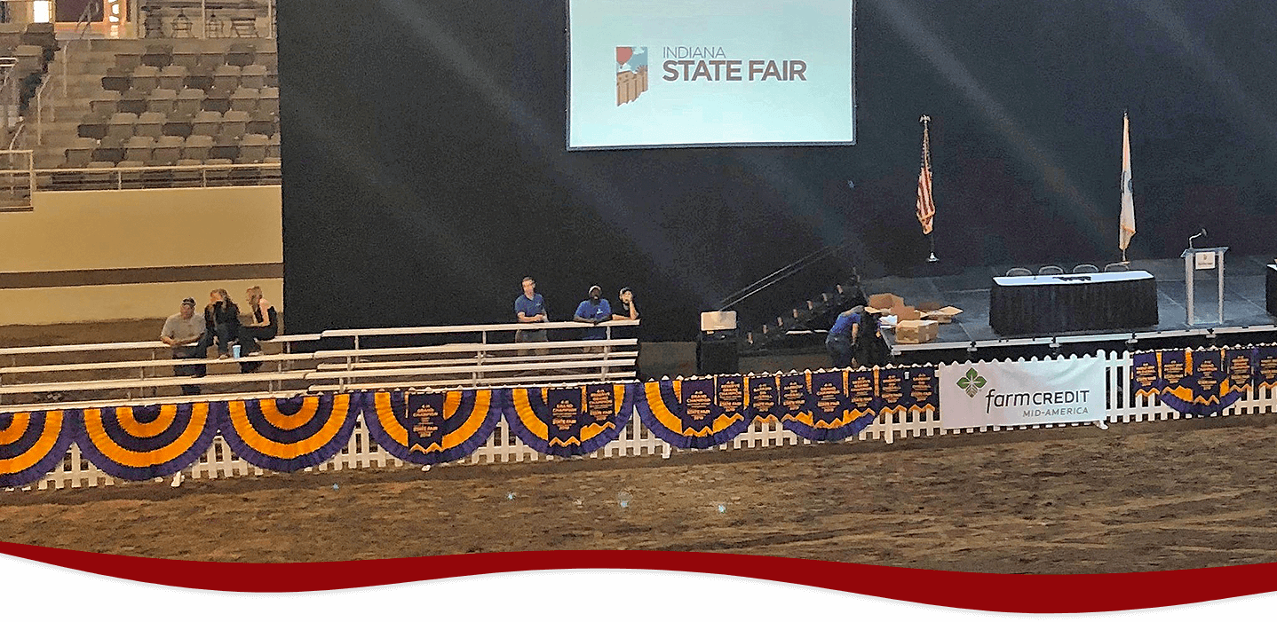 Custom purple and yellow bunting flags at the Indiana State Fair