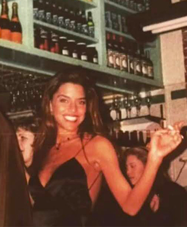 The owner in an LA club in 90s fashion