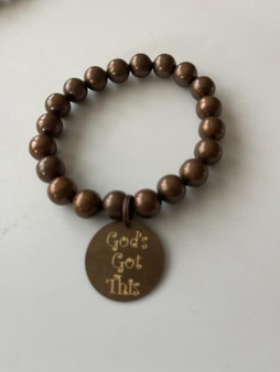 Bronze bracelet with Gods Got This on tag