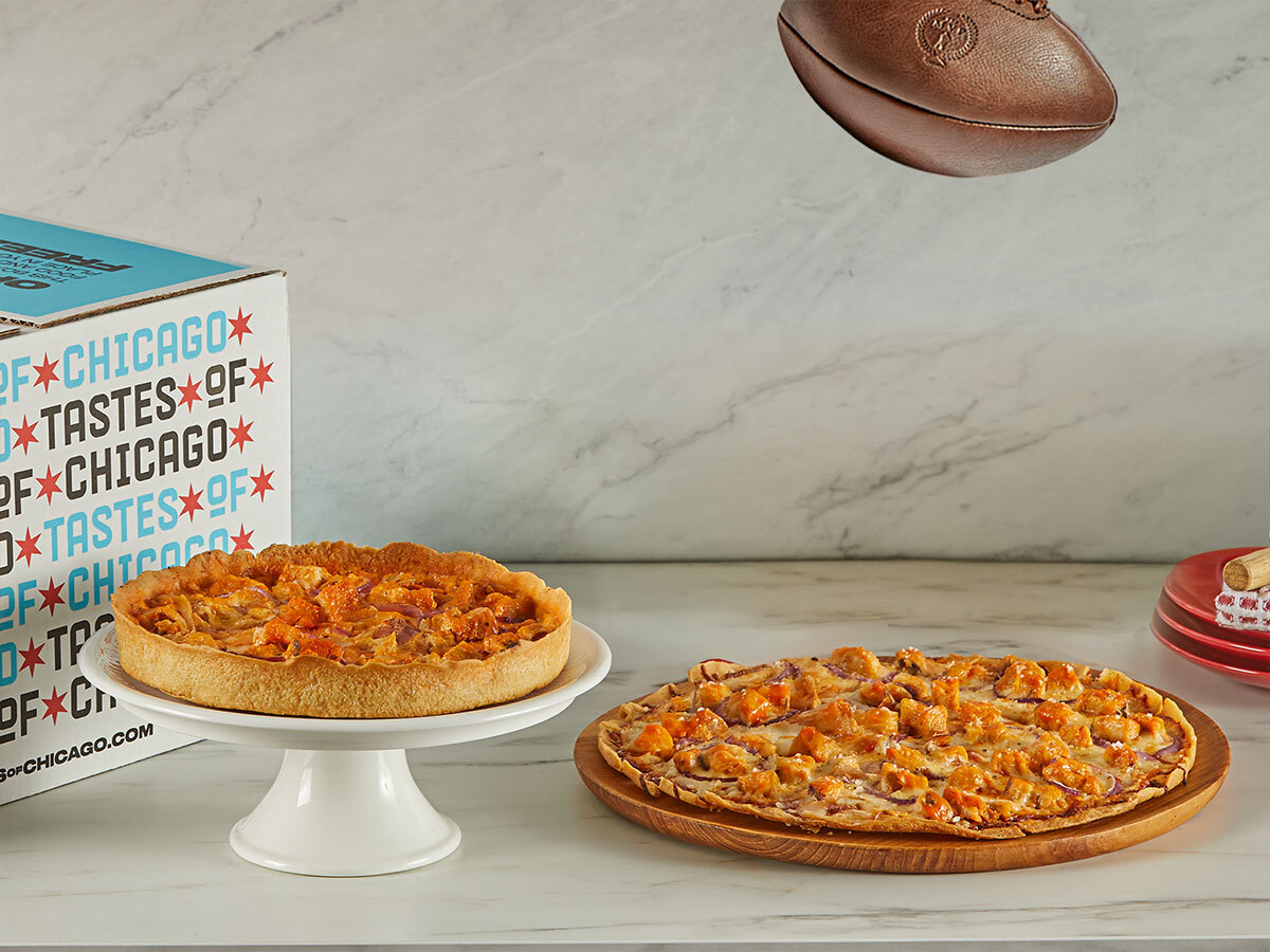 Mike's Hot Honey Pizza with cheesy slice being served.