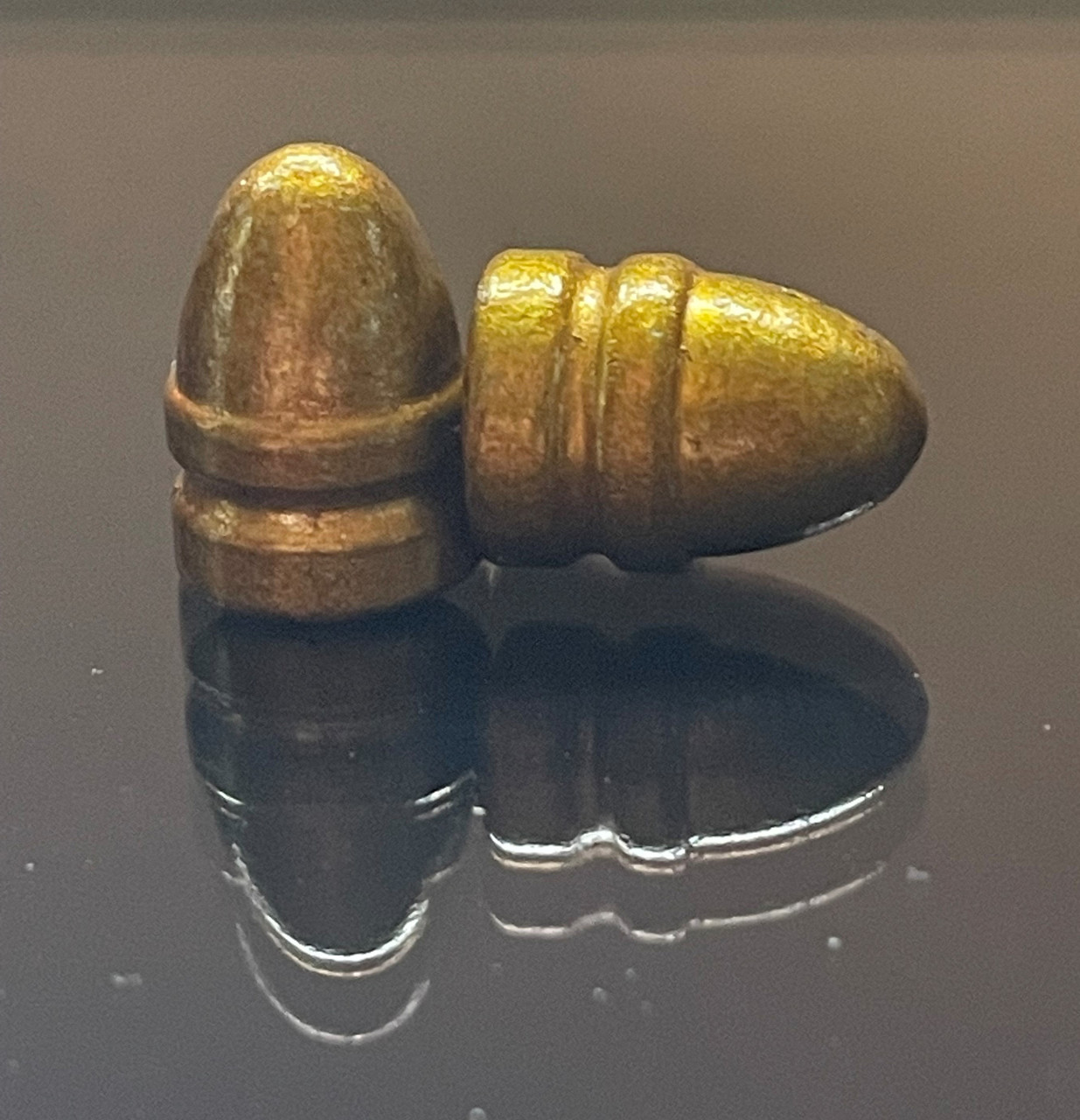 Round nose round 6’4” 45L 45 Caliber 200 Grain Round Nose Hi-Tek coated bullets