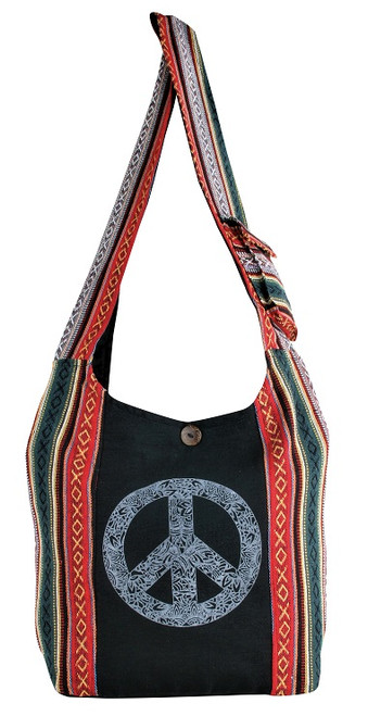 Large barrel bag with cell pocket on the 50 inch strap. Peace sign print on Cotton. Zipper close, zipper pocket inside