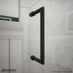 Black shower door handle mounted on a tiled wall