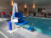 Poolside Aqua Creek Mighty 400 Pool Lift with blue seat, designed for accessibility, safety