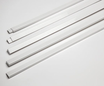 Shower flange trim kit components in white, designed for easy installation and wall repair