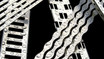 Linear shower drain components with water droplets