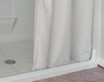 Weighted shower curtain in a curbless shower setting