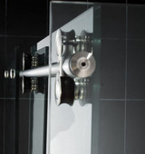 Close-up of Dreamline Enigma shower enclosure hardware, showing the sleek