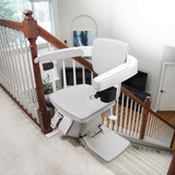 Bruno Elan SRE-5000 indoor stairlift showcasing compact construction, comfortable seating, and reliable battery-powered performance for safe navigation of stairs in residential homes.