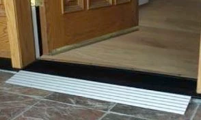 Aluminum threshold ramp installed at doorway