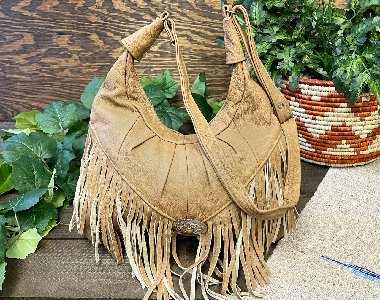 Purchase Wholesale cowhide bag. Free Returns & Net 60 Terms on Faire.com