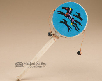 This is a hand made rawhide spinner drum.