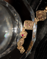 gold bracelet with rubies