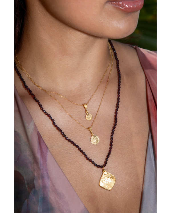 But You hand knotted garnet and 18k gold vermeil coin