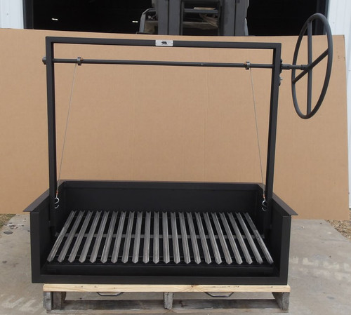 Front view of the Model 241143 Built-In Argentine Grill featuring a black steel finish, open-front firebox, and a large side wheel for height adjustment.