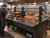 NorCal Unit #4770 commercial split charbroiler in restaurant kitchen with ventilation hood