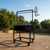 Portable Grill with V-Grate, casters, wood & charcoal burning located in a backyard setting. For Residential and Commercial.