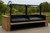 Custom metal outdoor kitchen grill insert with a stand, featuring a tall frame and twin crank wheels for raising and lowering the grates