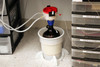 4" ECO Funnel in a lab under an HPLC LC-MS machine collecting solvent waste