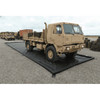 UltraTech Containment Berm, Foam Wall, 15' x 20' x 4", 22 oz. (24 MIL) PVC, in a desert setting with military vehicles on top of the black containment berm.