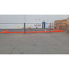 UltraTech Berm Builder (2) Corners, 6-inch, orange safety barrier surrounding a space, with black and red vertical posts in an outdoor construction area.