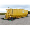 UltraTech Foam Wall Plus Berm, 10' x 10', Copolymer 2000, yellow foam containment berm with a person installing it in an outdoor industrial area.