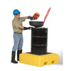 UltraTech Spill Pallet P4 Plus, with drain, yellow, used for hazardous liquid containment, with a person refilling a drum on top of the spill pallet.