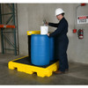 UltraTech Spill Pallet P4 Plus, With Drain, Yellow - Industrial spill containment pallet with blue barrels and a worker filling a container in a warehouse with chemical storage sign.