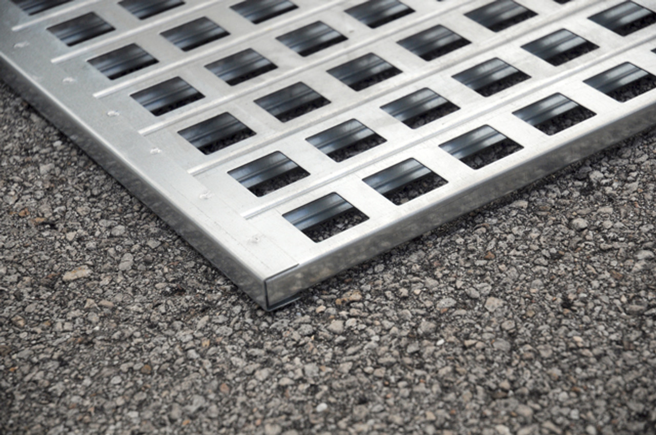 Grating is removable for easy clean-up and maintenance.