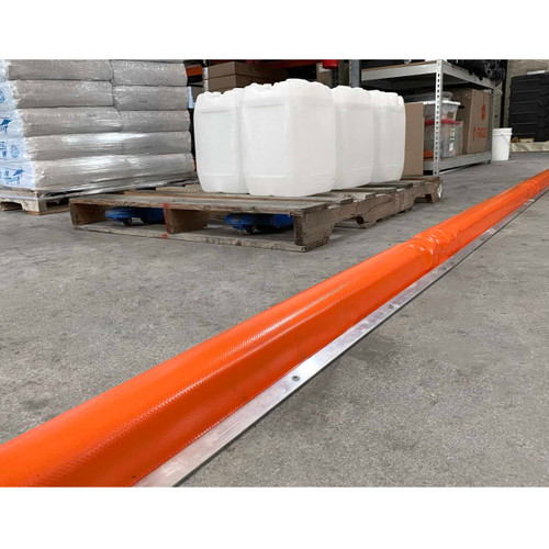 UltraTech Berm Builder Plus, 2'', with mounting strips and anchors, orange safety barrier installed on concrete floor.