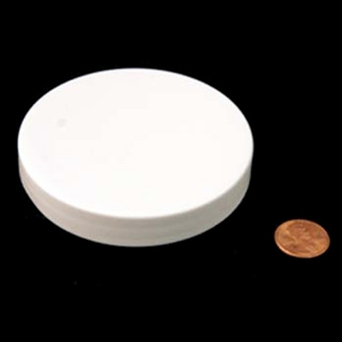 Product image of an 83mm (83-400) White PP Pressure Sensitive Lined Smooth Cap (PKW-C083C4SPPSW). This cap is used for sealing containers and features a smooth texture with a pressure-sensitive lining for reliable closures