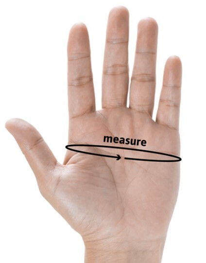 Measure your hand at the widest part