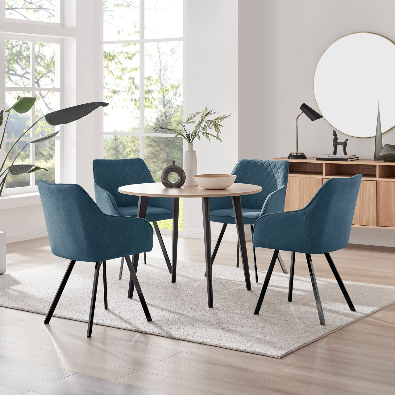 Koko Oak Effect Round Dining Table Falun Black Leg Chairs