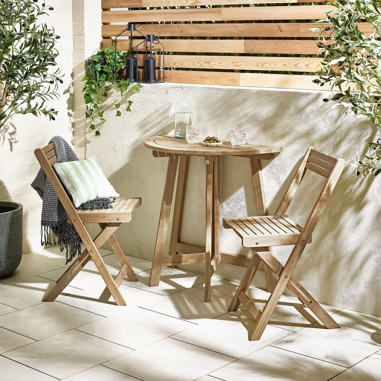 small outdoor wooden table and chairs