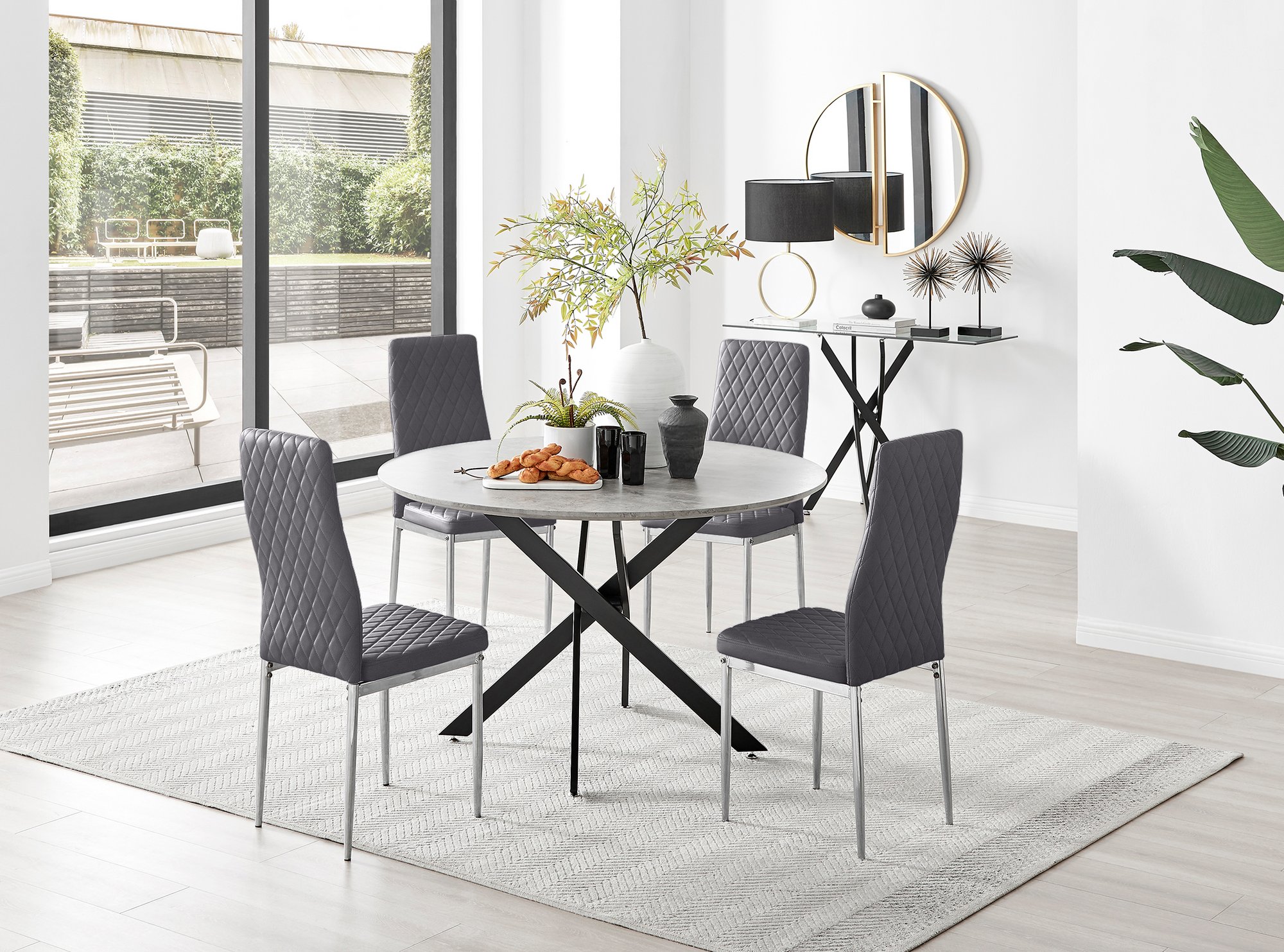 Novara 120cm 4 6 Seater Round Glass Dining Table with Black Metal Starburst  Legs for Modern Industrial Minimalist Dining Room