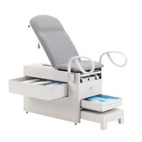 1000AX-XXDX-XXX-25 Brewer Company Versa Exam Table with Standard Upholstered Top included, Pneumatic/Manual Back, 500 lb. Weight Capacity, Pass-through Rear Drawer, 5 Year Warranty, and Seamless Upholstery in Saddle