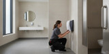 How should facilities plan feminine care products for restrooms?