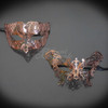 Rose gold dresses deserve to have a masquerade mask to help complete the look!