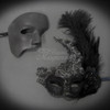 Mardi gras party masks with feathers for couples.