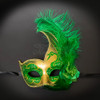 mardi gras mask with green feathers, green glitter and gold paint