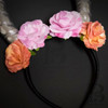 Whimsical and beautiful deer antler headband for Halloween, holidays and costume parties. The black reindeer antlers come in black, adorned with large blush pink roses. This antler makes an excellent headpiece for costumes, cosplays photo shoots and more.