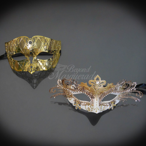 Couple's masquerade masks for the creative couple. Wedding theme in gold and white is perfect and will look celestial.