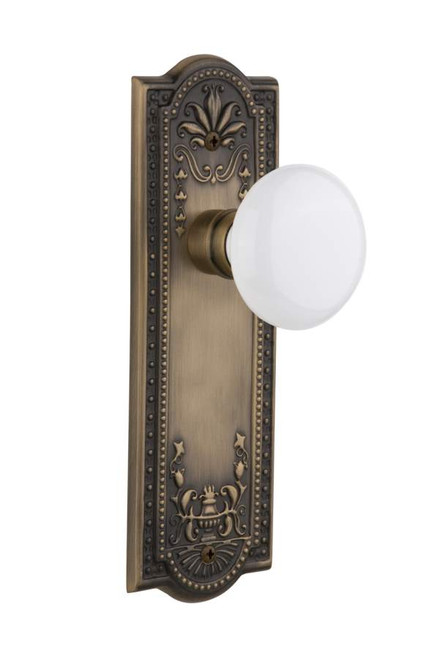 Nostalgic 701891: Meadows Backplate w/White Porcelain Knob Passage Door Set - Antique Brass